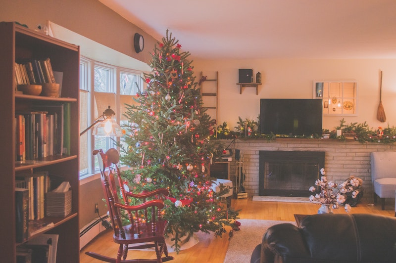 rocking chairs in the living room by Christmas tree - furniture gifts